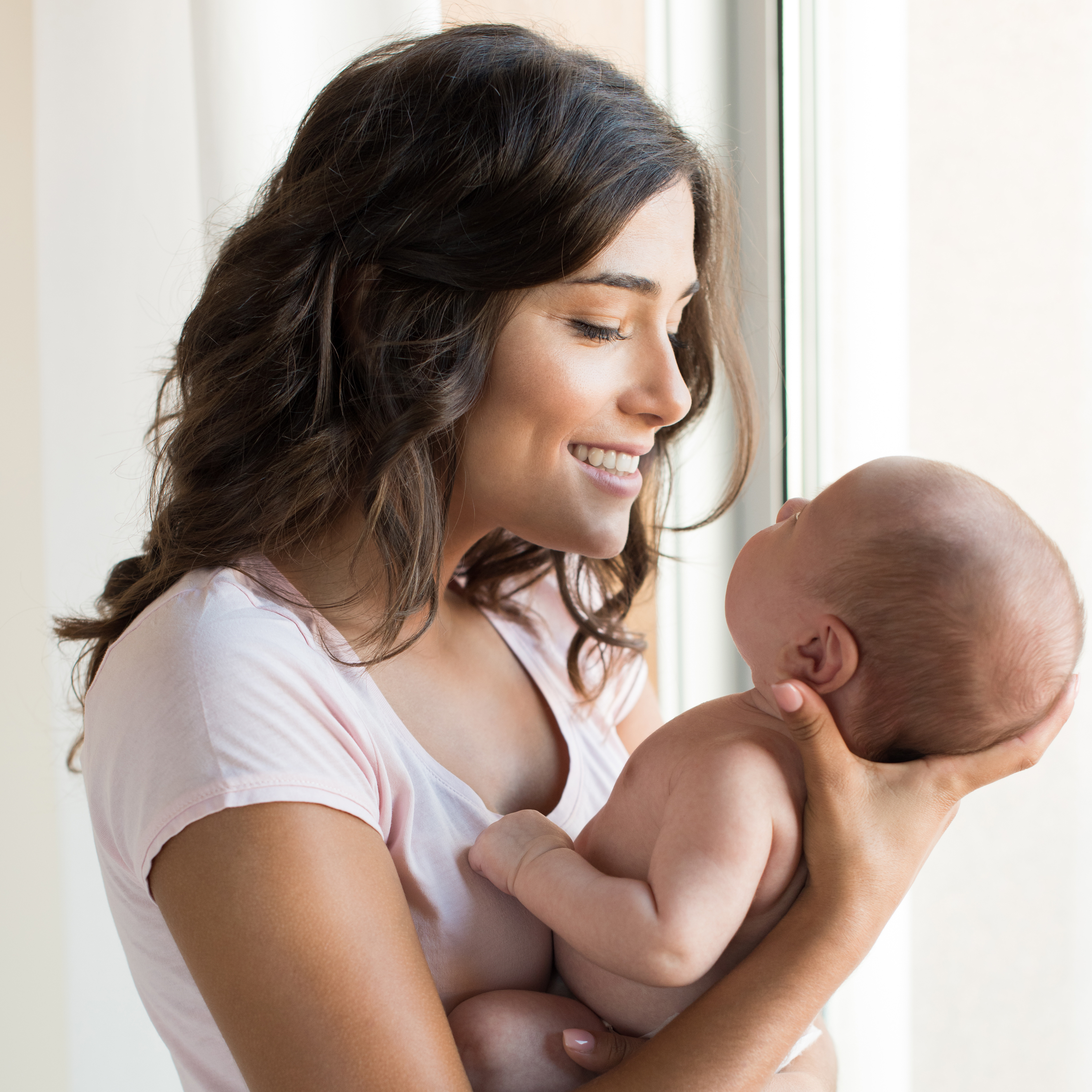 Smiling mom with baby.png__PID:1745bce2-65d5-4b86-a765-11ff0fe5c9b5