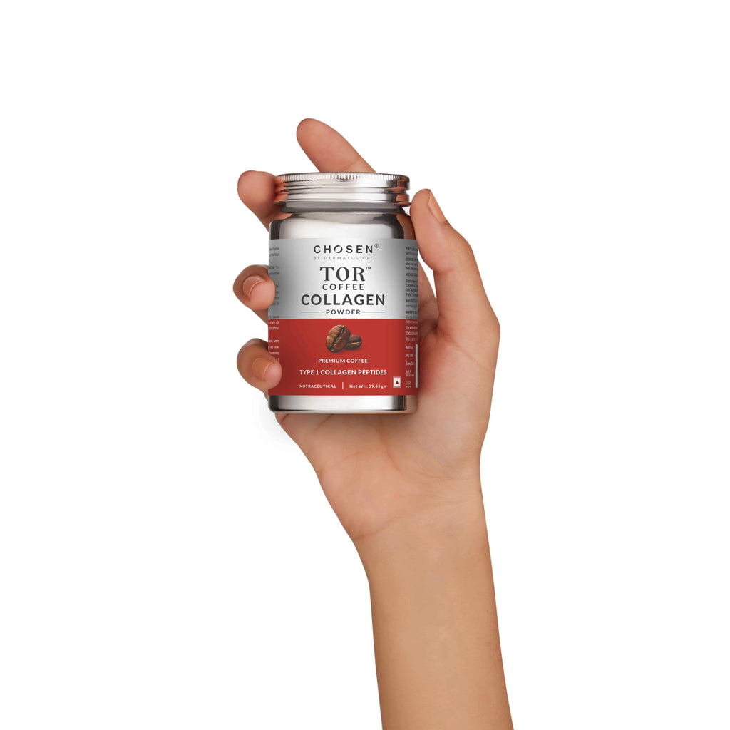 Female hand holding tor coffee collagen tin